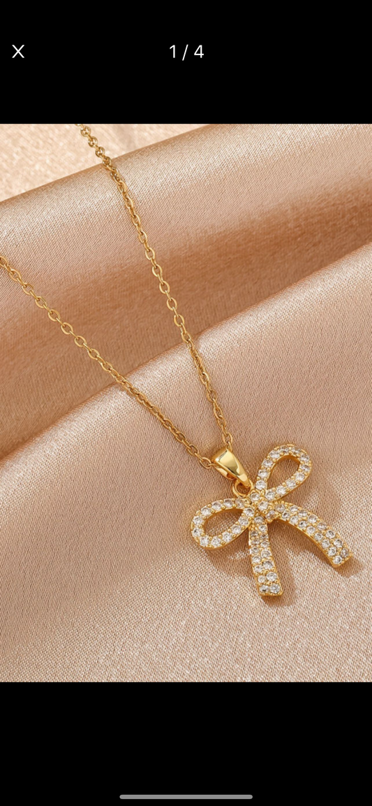Gold plated rhinestone bow necklace